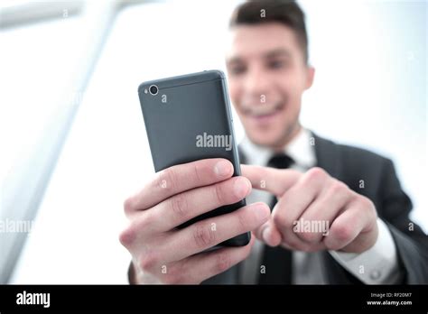 Businessman Reading A Text Message Stock Photo Alamy