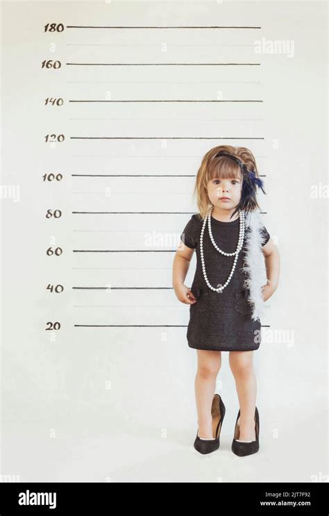 Charming Baby In Gangster Costume At The Police Station Stock Photo Alamy