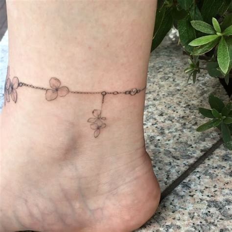 16 Delicate Flower Tattoos Just In Time For Your New Spring Ink Ankle