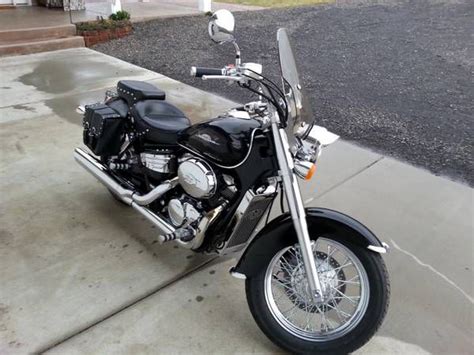 This bike was owned by a friend of mine in fort myers florida who very seldom used it and was stored at the rear of. 1999 Honda Shadow ACE 750 for sale on 2040-motos