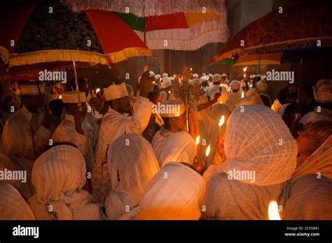 Ethiopian Pilgrims And Priests Celebrating Fasika In The Church Of Bet