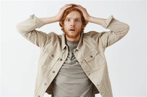 Waist Up Shot Of Worried Insecure Cute Redhead Adult Husband With Beard