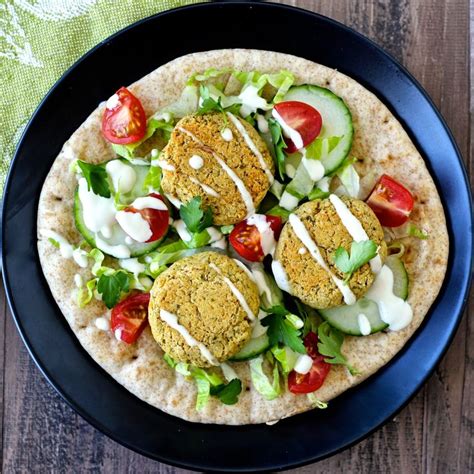 This falafel recipe is full of fresh ingredients, easy to make, and irresistibly delicious! Baked Falafel | Recipe | Baked falafel, Vegetarian entrees ...