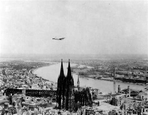 In may 1945, us pilots embarked on hundreds of reconnaissance flights, aboard the same bombers which had razed much of germany to the ground. B-24 over ruins of Köln (Cologne) 1945 | Keulen