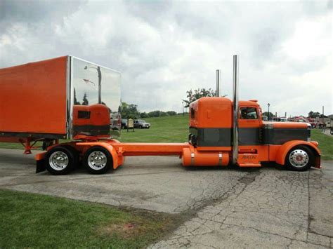 Stretched Orange Rig Big Ford Trucks Big Rig Trucks Diesel Trucks