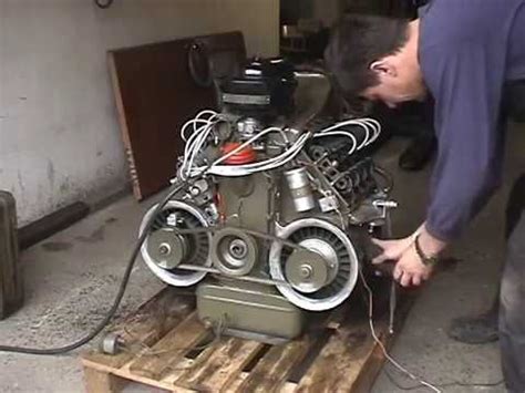 At the top of the cylinder head all the channels converge to a single outlet. vzduchem chlazený Motor TATRA 603 V8, air-cooled engine ...