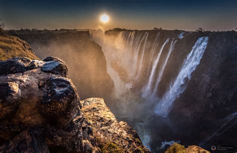 Sunset At Victoria Falls Victoria Falls Travel Pictures Waterfall