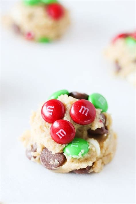 Cookies With M And M Candies Are On A White Surface Ready To Be Eaten