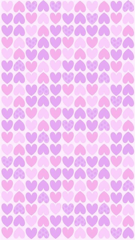 Pink And Purple Hearts Are Arranged In Rows On A Light Pink Background