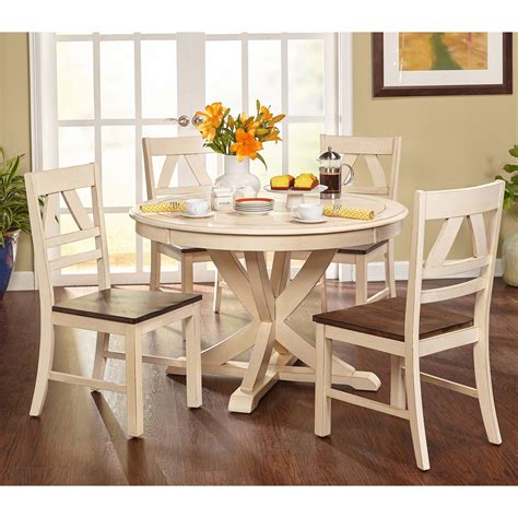 Each table is handcrafted from your choice of solid wood and stained to suit your home. Simple Living Vintner Country Style Dining Set (With ...