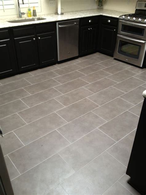 Light Grey Rectangular Floor Tile Tile Flooring Has Been Used Around
