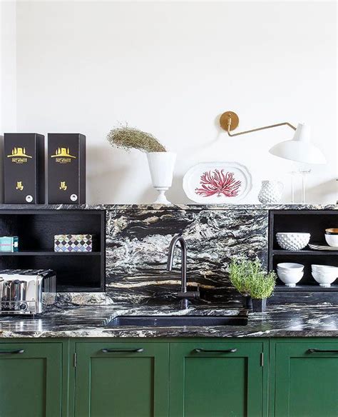 Dark Green Kitchen Cabinets With Black And White Marble Countertops