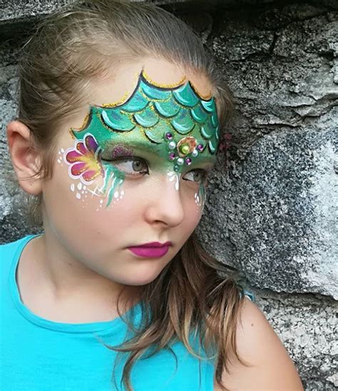 Who is the artist that painted the mermaid? Up Your Game with Mermaid Body Art! | Fin Fun Blog