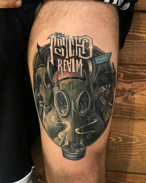 Psycho Realm Tattoo Located On The Thigh
