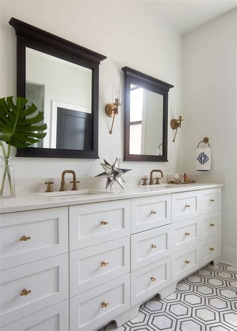 Check out these 20+ ideas to make your bathroom and vanity reflect the black pendant lamps are a welcoming touch for a desirable contrast on neutral colors. Black wood framed mirrors balance well with a white dual ...