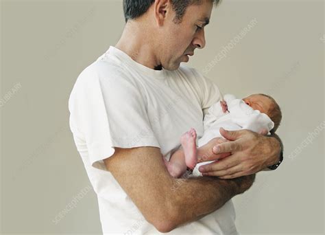 Father Holding Baby Stock Image F003 7463 Science Photo Library