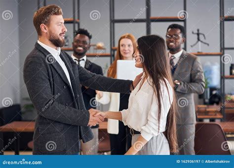 Caucasian Bearded Leader Shake Hand To Young Woman Stock Image Image Of Business Black 162936197