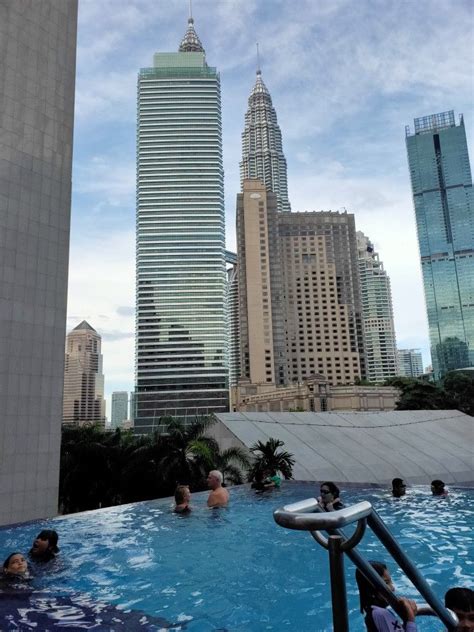Sengkang sports and recreation centre 311 km. View from swimming pool of Impiana Hotel, Kuala Lumpur in ...