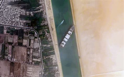 The part of the trunk of the 4. Stuck ship Ever Given refloated as Suez Canal block end in ...