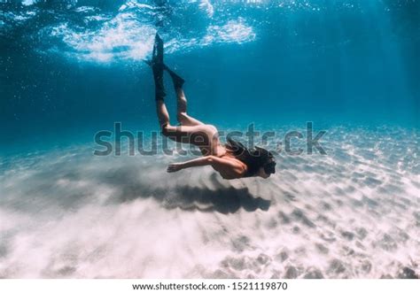 Naked Woman Freediver Glides Over Sandy Stock Photo