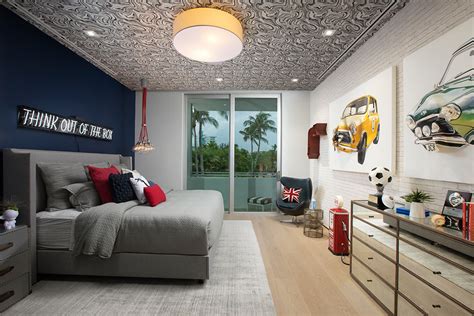A shared teenage boys' bedroom with bunk beds and colorful carpet. Fun Room Ideas: Modern and Mature Boy's Bedroom Design