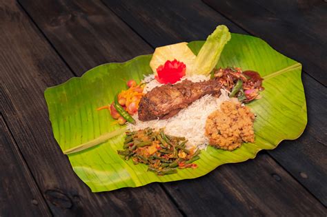 Menike Traditional Sri Lankan Rice And Curry Wrapped In Banana Leaf