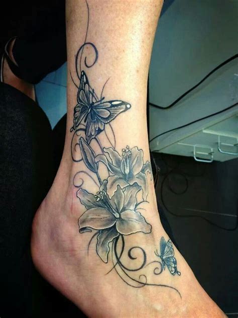 Elegant Design Butterfly Tattoo Butterfly With Flowers Tattoo Butterfly Ankle Tattoos