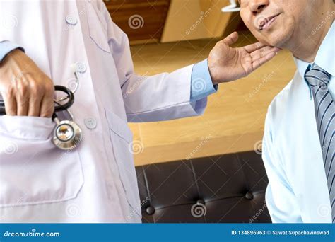 Doctor Explaining Patient Symptoms Or Asking A Question Stock Image