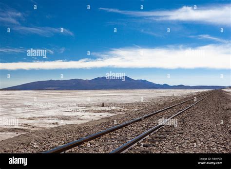 Old Abandoned Railway Tracks Run Across The Salt Plain On The Salar De
