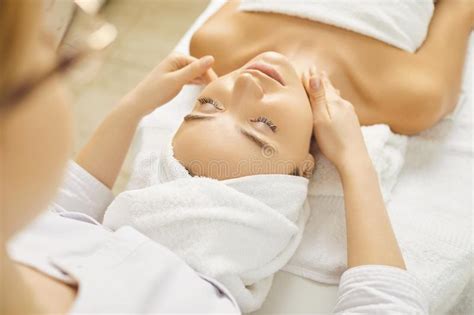 Facial Massage To A Beautiful Girl In A Beauty Clinic Stock Image Image Of Pampering Female