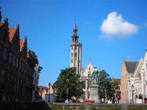 Jan Van Eyckplein And Poorters Loge Bruges Belgium Flickr