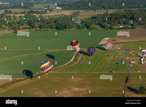 Rising Hot Air Balloon Over Hi Res Stock Photography And Images Alamy
