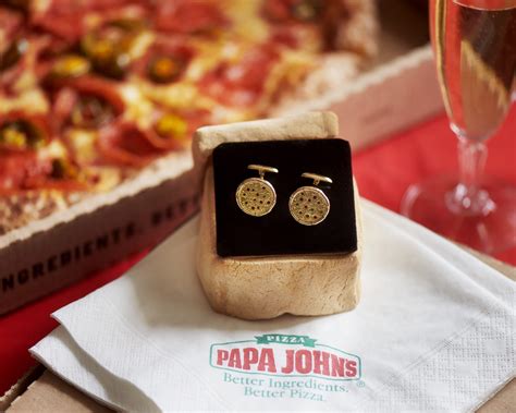 Papa Johns launches 18k gold ‘crust-links’ | Jewellery Focus
