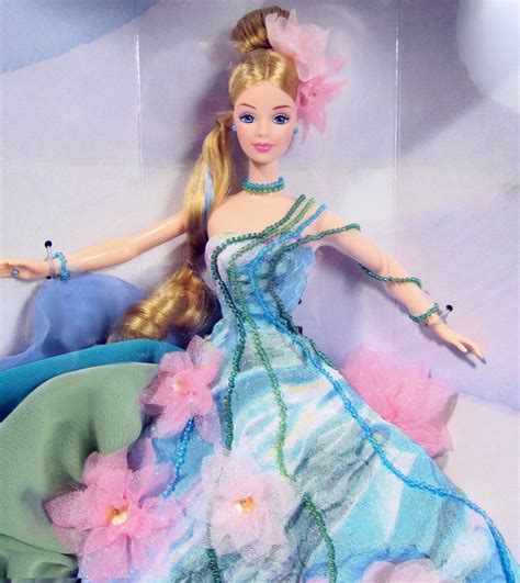 A Barbie Doll In A Dress With Flowers On It