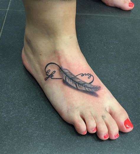 Infinity Symbol With Feather Tattoo