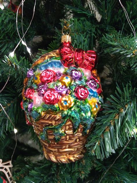 A Christmas Ornament Hanging From A Tree