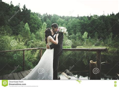 Love And Passion Kiss Of Married Young Wedding Couple