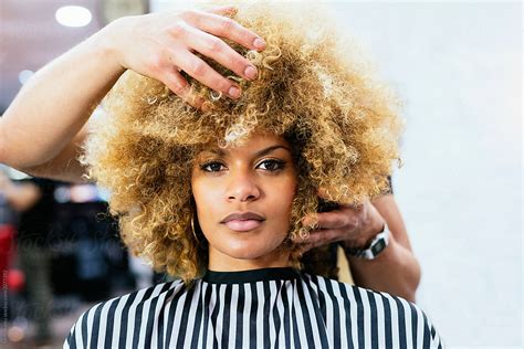 Attractive African American Woman In Hairdressing Salon By Stocksy Contributor Santi Nuñez