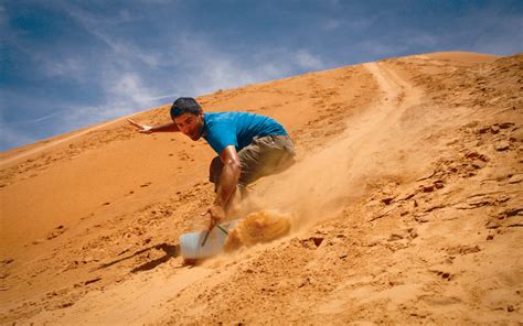 Go Sandboarding On The Red Dunes Of Mui Ne Evaneos