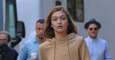 Gigi Hadid Flashes Her Washboard Abs In Crop Top And Slips Into Skin Tight Trousers At New York