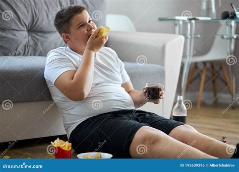 Fat Overweight Teenager Boy Has Bad Nutrition Eat Unhealthy Food Stock