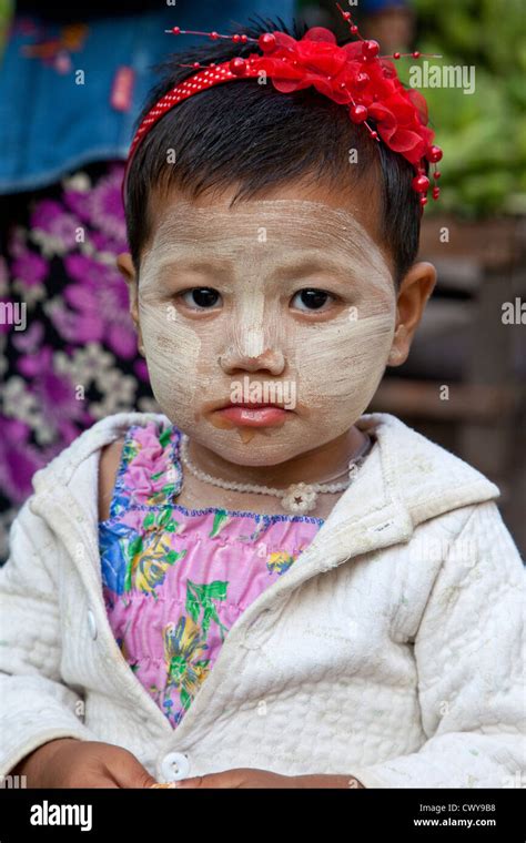 Myanmar Burma Mandalay Little Burmese Girl With Thanaka Paste On Her Face A Cosmetic