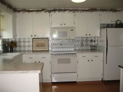 With over 10 years of experience, he specializes in bathroom and kitchen renovations. Kitchen redo. Tin ceiling backsplash. | Kitchen backsplash ...
