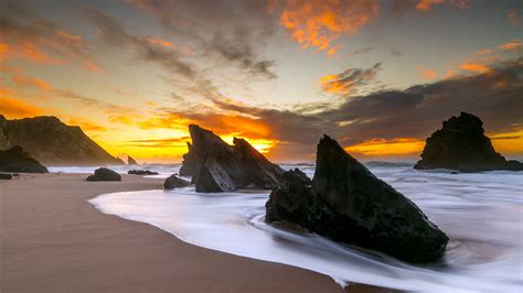 Large Rocks On Beach Shore 4k Sunset Wallpapers Sunrise Wallpapers