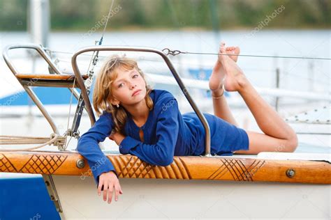 Playful Pretty Little Girl On Sail Boat — Stock Photo © Zagorodnaya