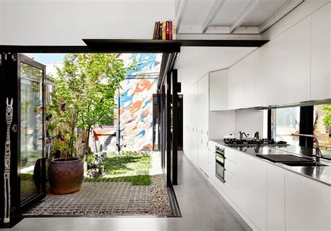 10 small courtyard garden video: Tiny House Design W/ Large Openings & Courtyard In Australia