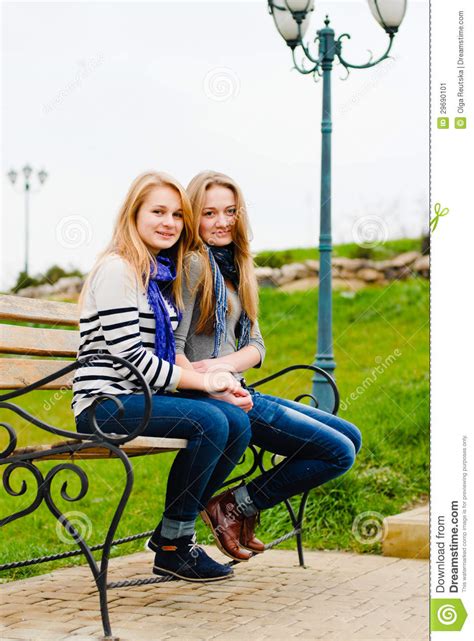 Two Happy Teen Girls Friends Having Fun Outdoors Stock