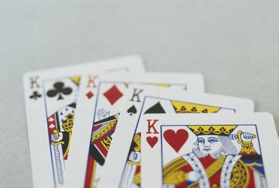 The spades and clubs are printed in black. The Origin of the Four Suits in a Deck of Cards