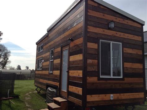 Panel siding is easy to install and is available in a variety of textures and colors. Siding | Tiny house, Outdoor structures, Shed