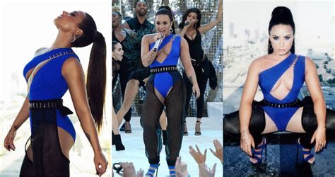 Demi Lovato Flashes Braless Assets As She Spreads Legs For Raunchy